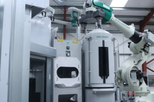 Fluidised bed, sander, robot system for shell-making